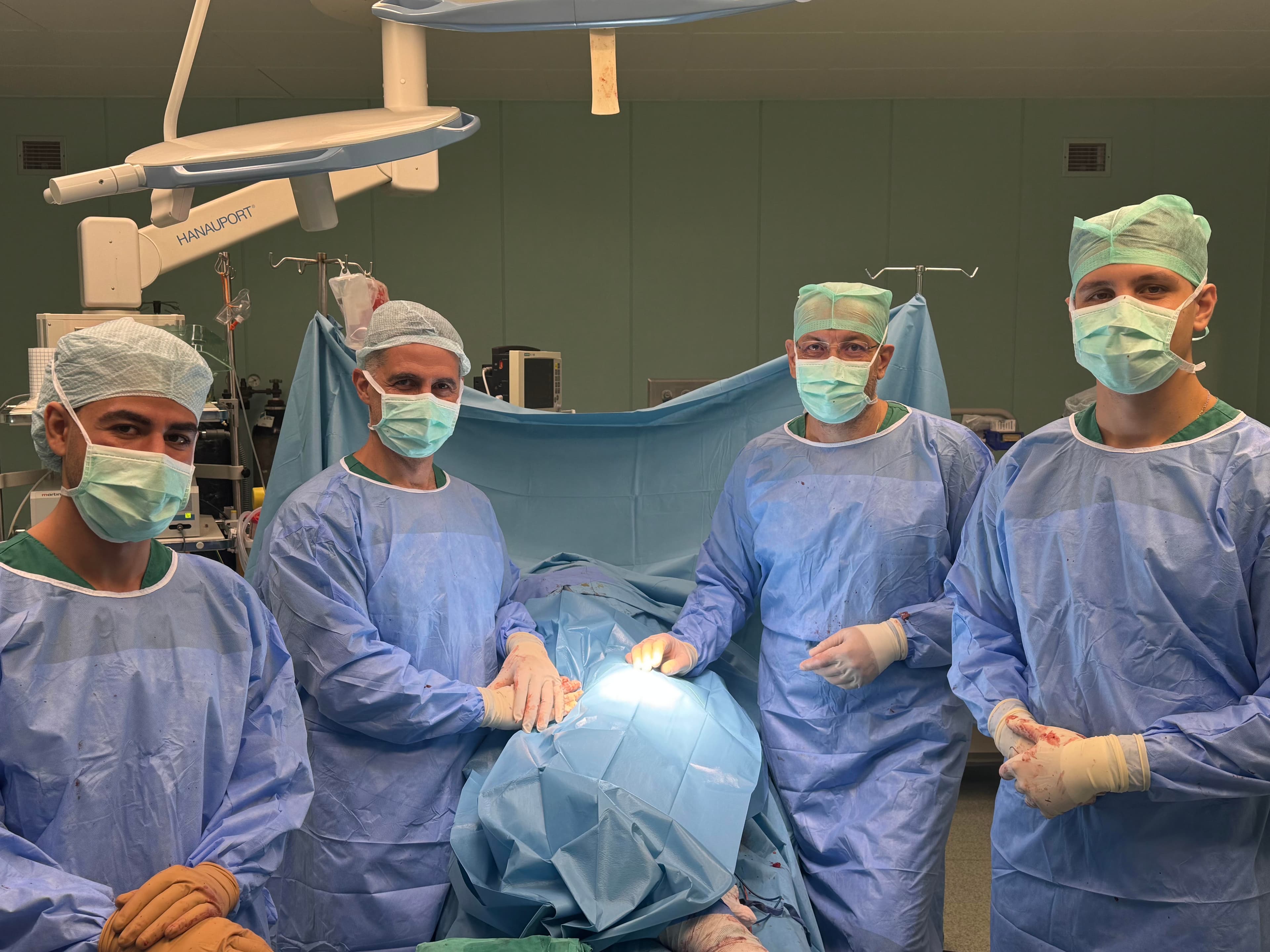Dr. Papadopoulos and the surgical team during a robotic total knee arthroplasty